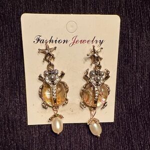 Elegant Gold Tone Pearl like Earrings